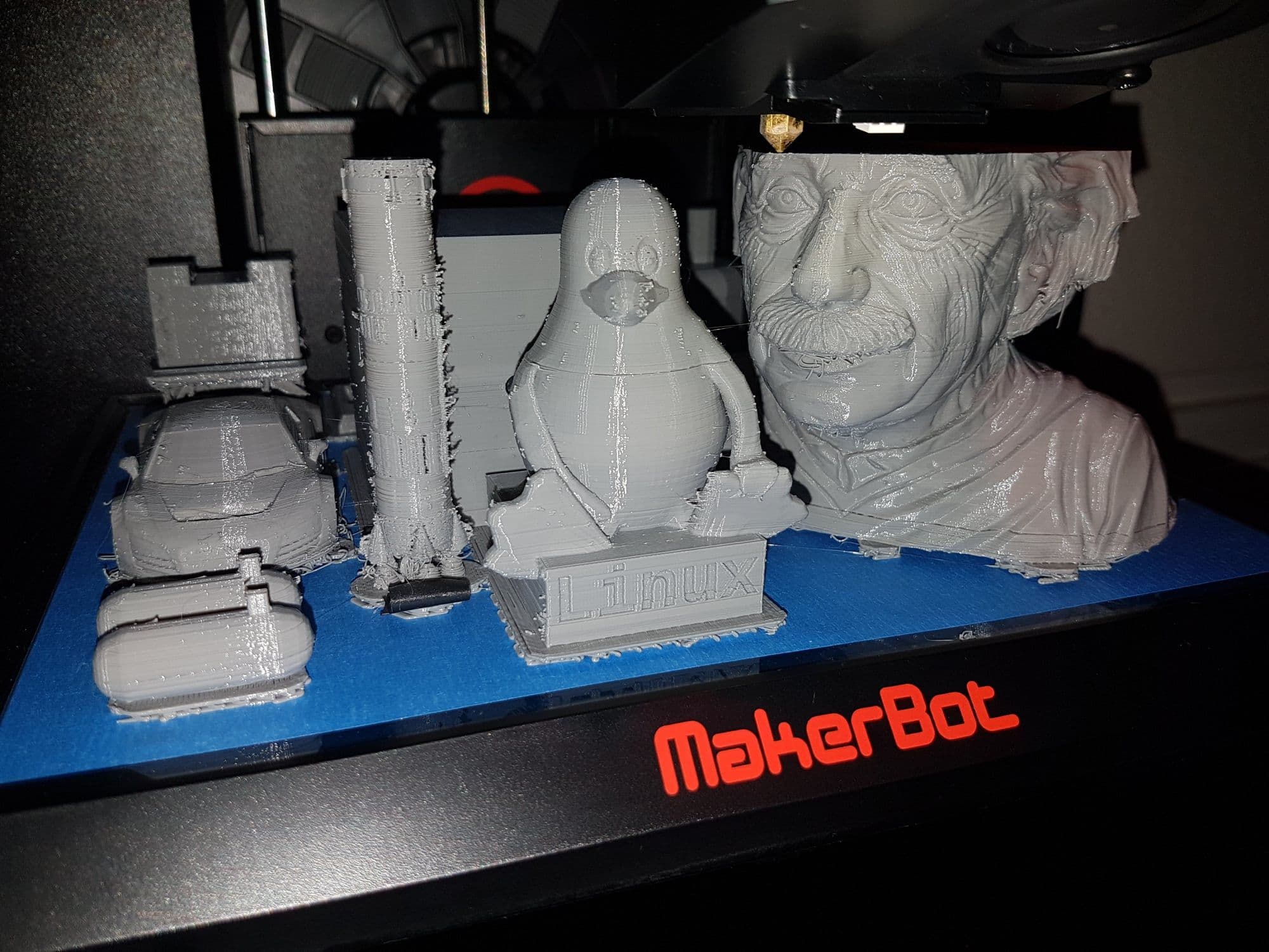3D printed collection — car, Linux penguin, Einstein bust on MakerBot